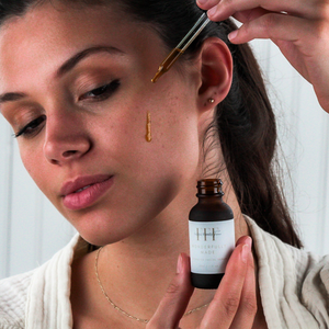 Ozonated Facial serum on face