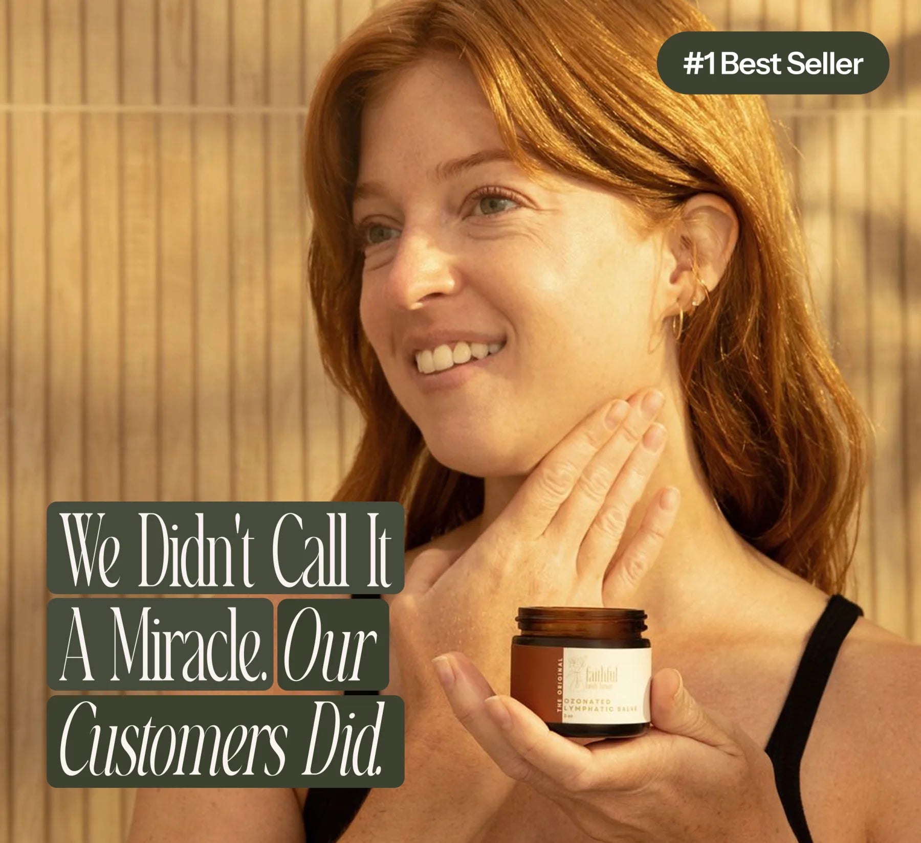 Woman applying the Ozonated Lymphatic Salve to her neck